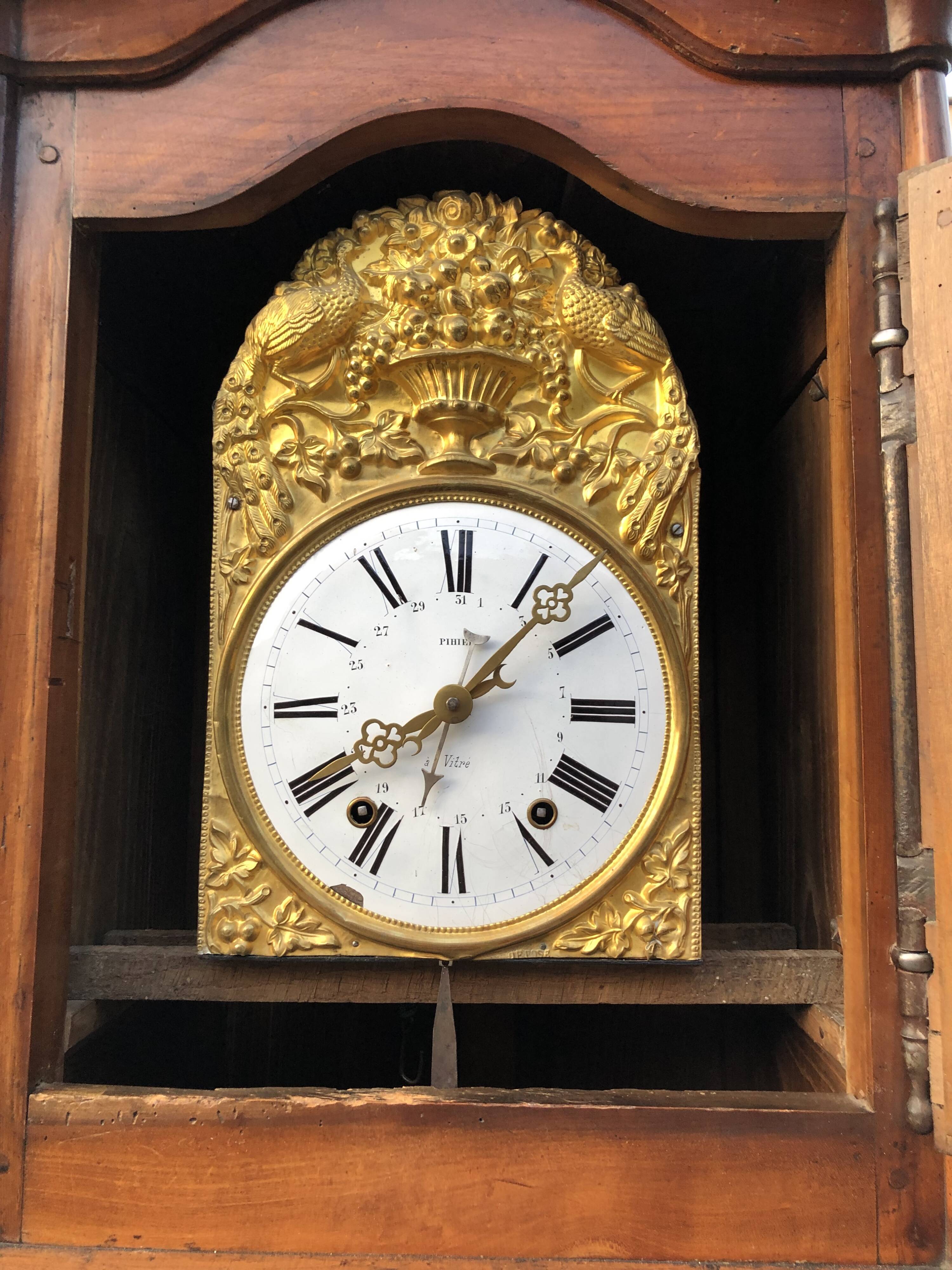 Comtoise clock in cherry style Louis XV period 19th region Fougères.