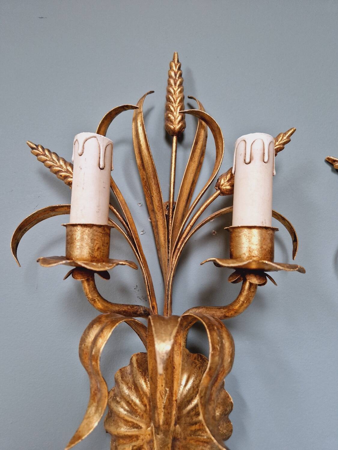 Pair of Italian wall sconces in gilded metal