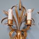 Pair of Italian wall sconces in gilded metal