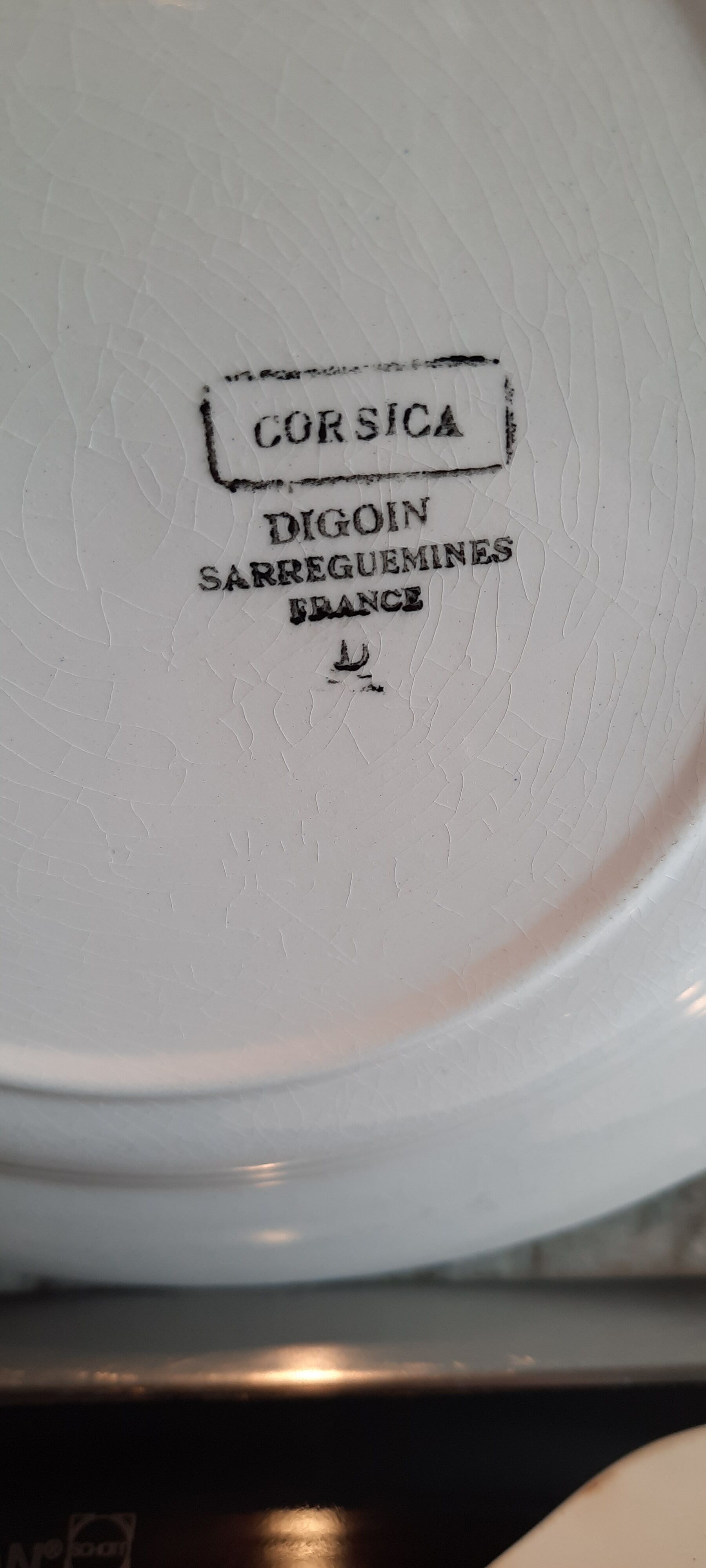 Old flat faience plates