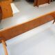 Double bed in vintage Scandinavian style from the 1960s with bedside tables.