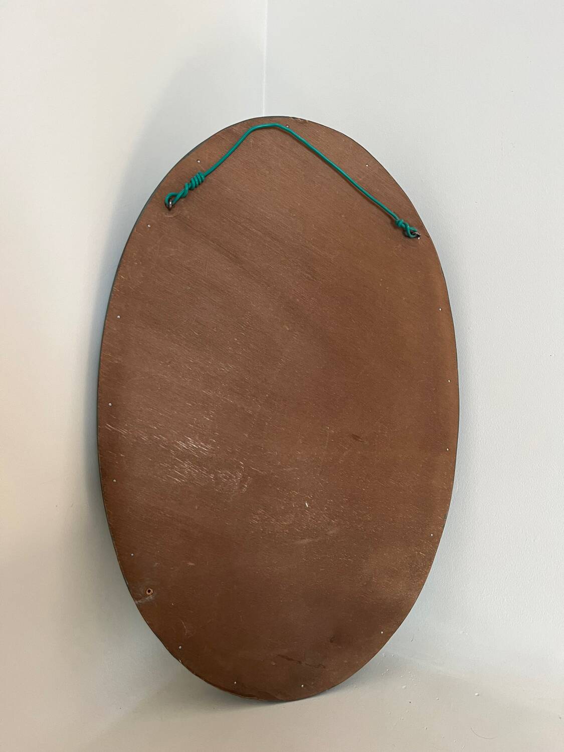 Green oval mirror