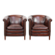 Set of two cow leather club armchairs in a luxurious red/brown colour