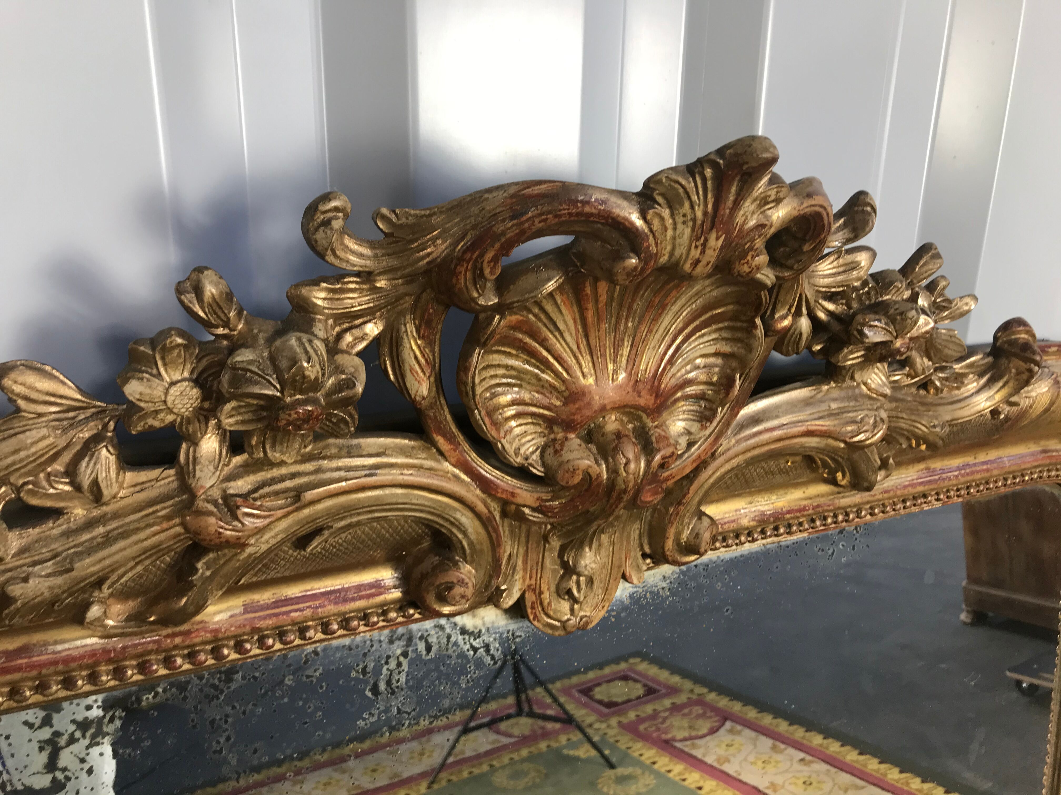 Louis Philippe's era mirror with a gold leaf pediment