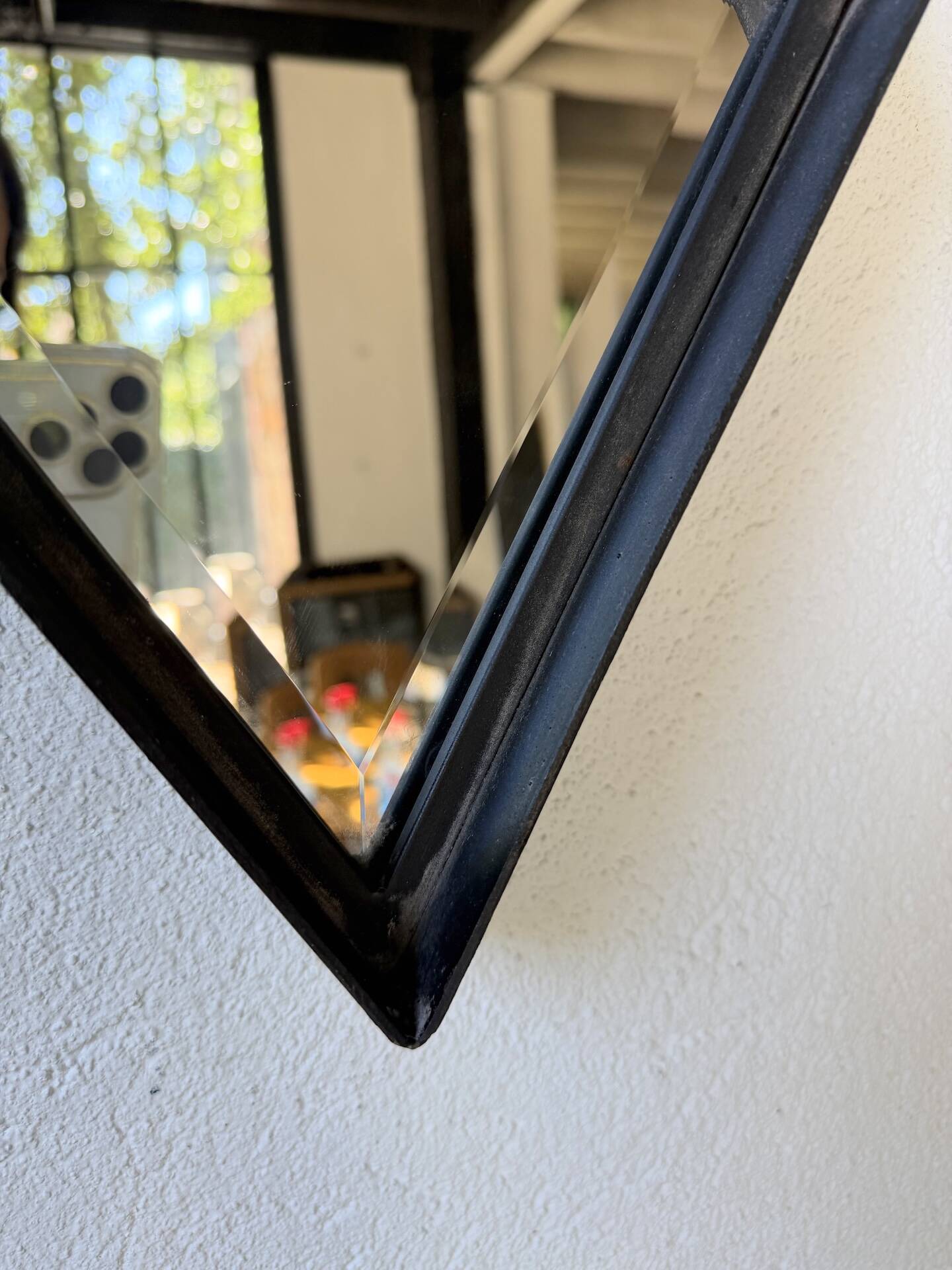 Miroir brutaliste losange en fer