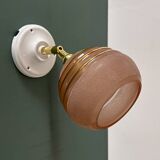 Vintage globe wall light in frosted pink and gold glass.