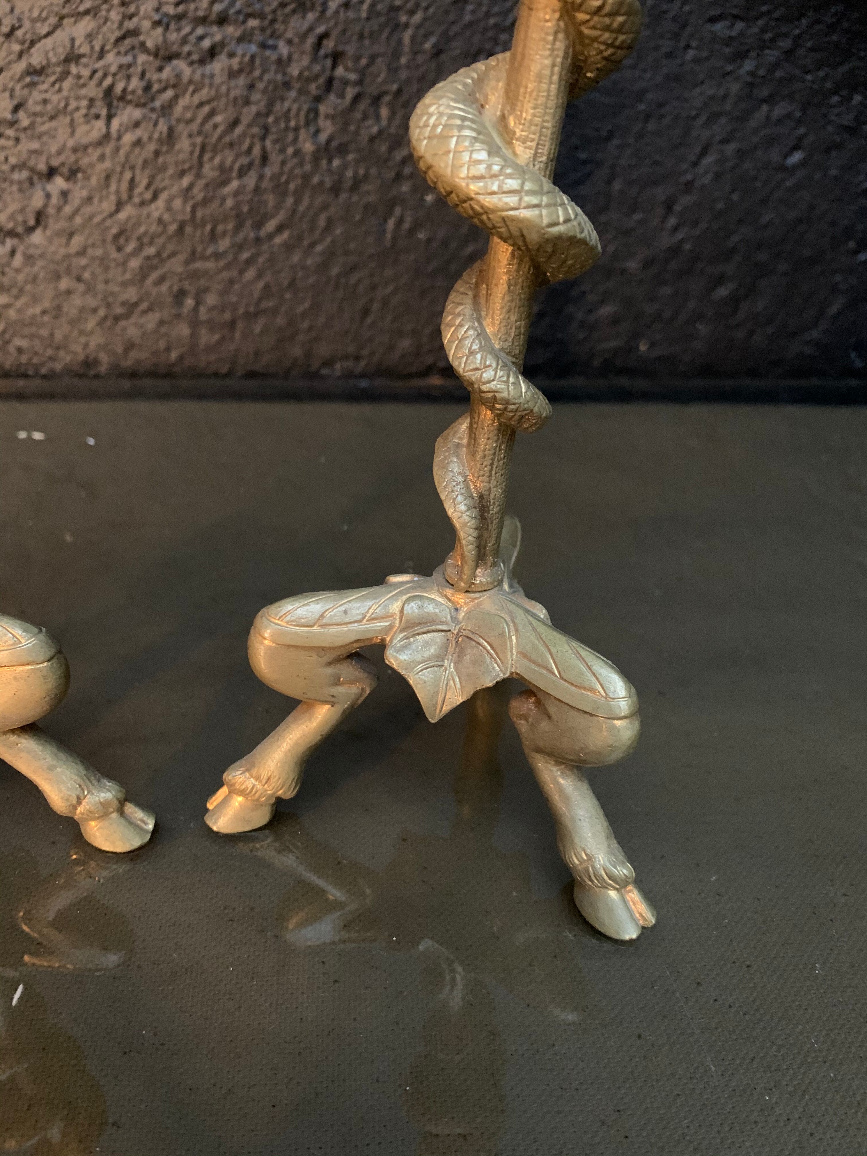 Pair of candlesticks with snakes, gilded bronze 19th century