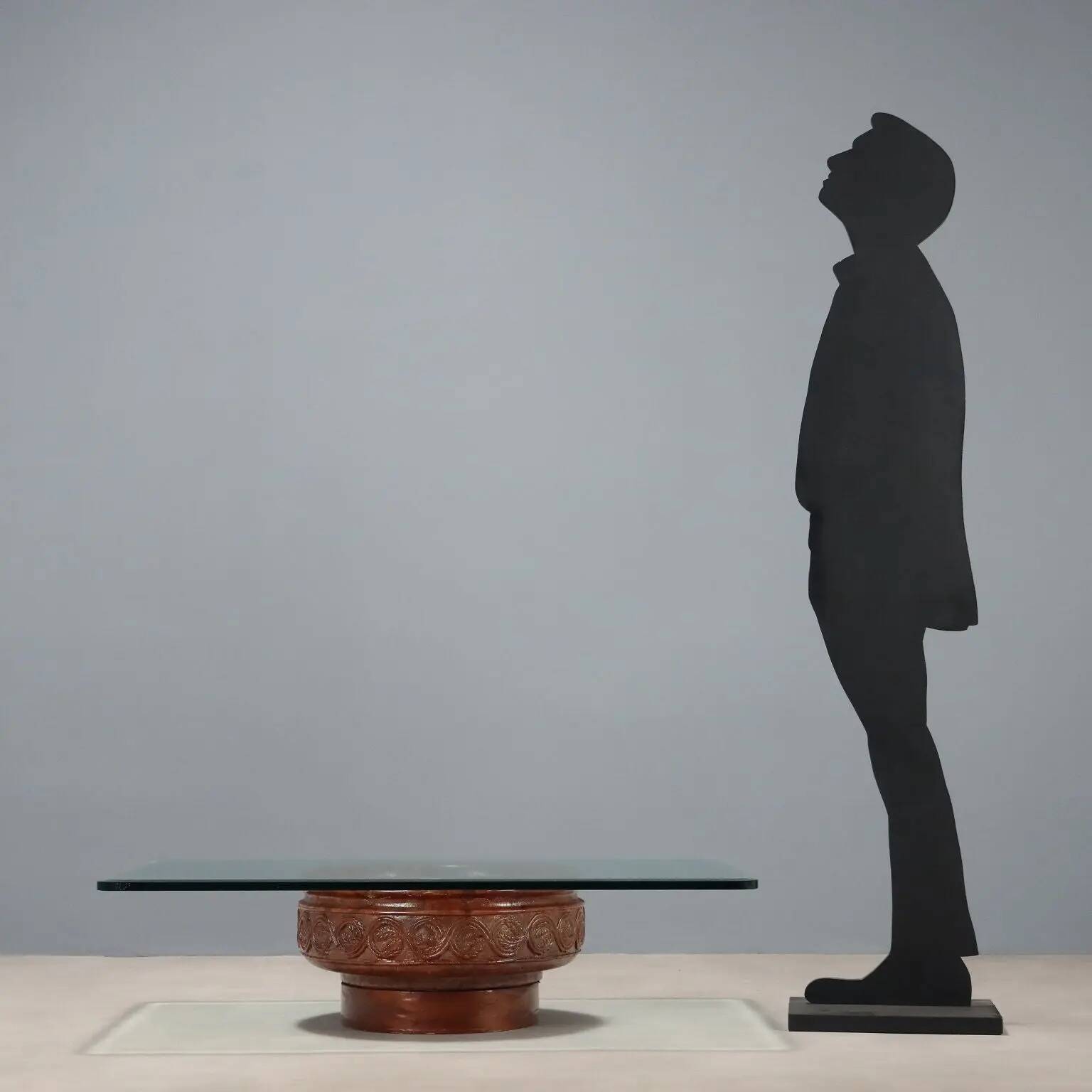 Vintage coffee table with a glass top and a terracotta base, 20th century.