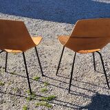 Pair of tonneau chairs by Pierre Guariche plywood base tubes 1954