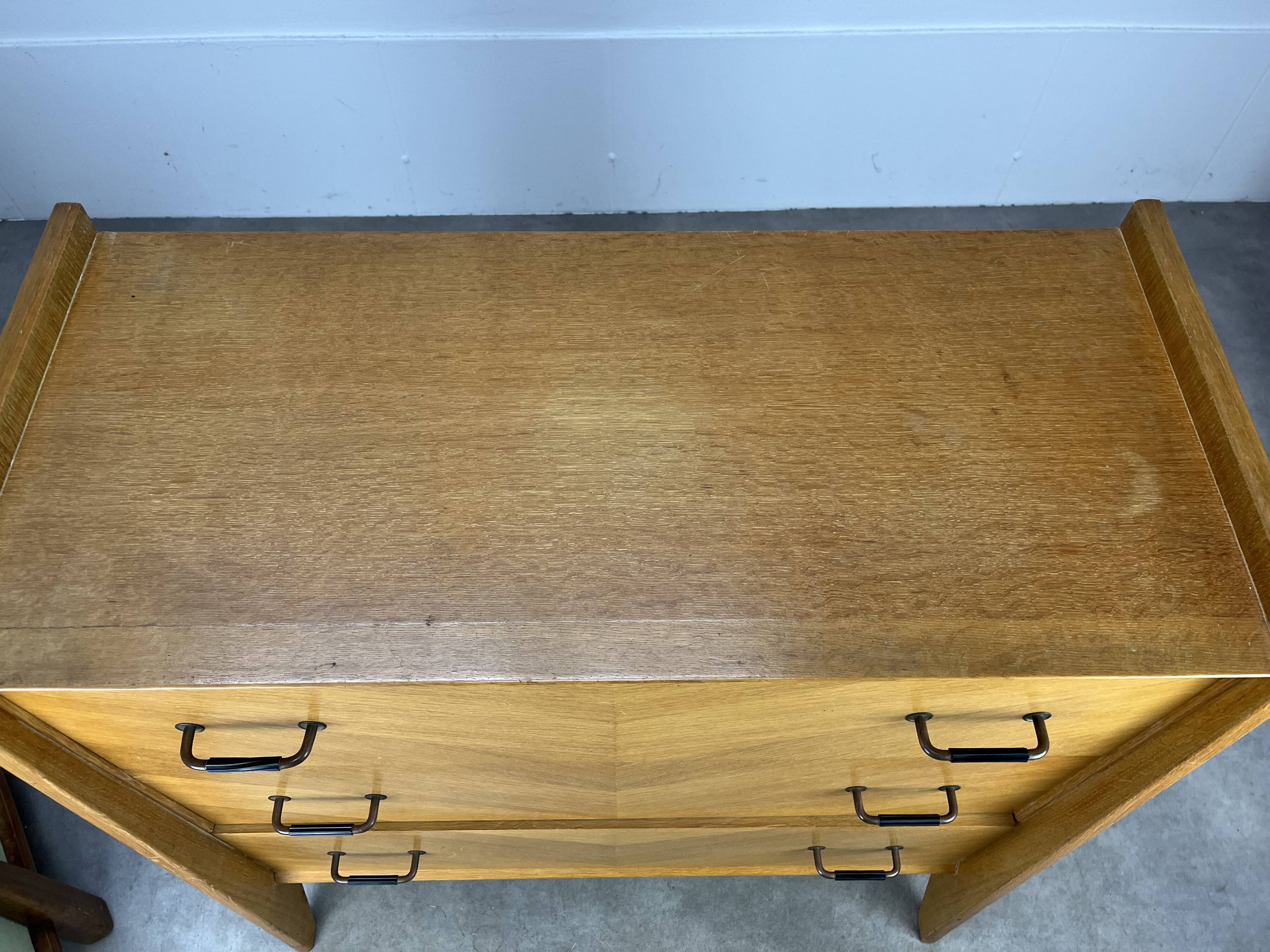 50s chest of drawers with blond wood compass feet