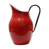 Red enameled metal pitcher
