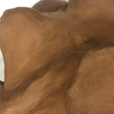 School bust of a female body in red clay terracotta