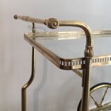 Neo-classical table in gilded metal and glass
