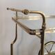 Neo-classical table in gilded metal and glass