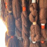 Handmade woven wool wall tapestry from the 70s and 80s, vintage macramé.