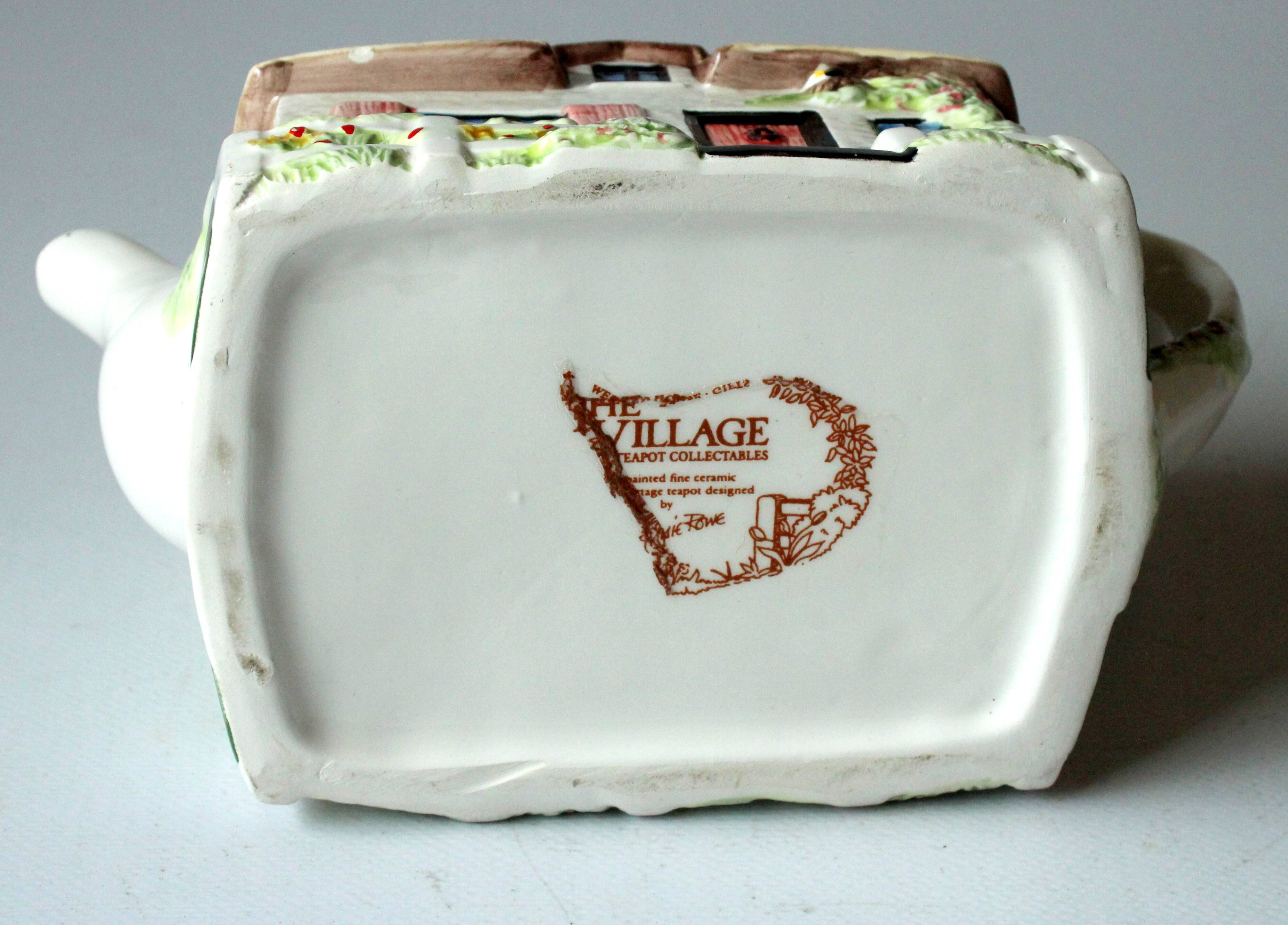 Handpainted fine ceramic design teapot "The Village"