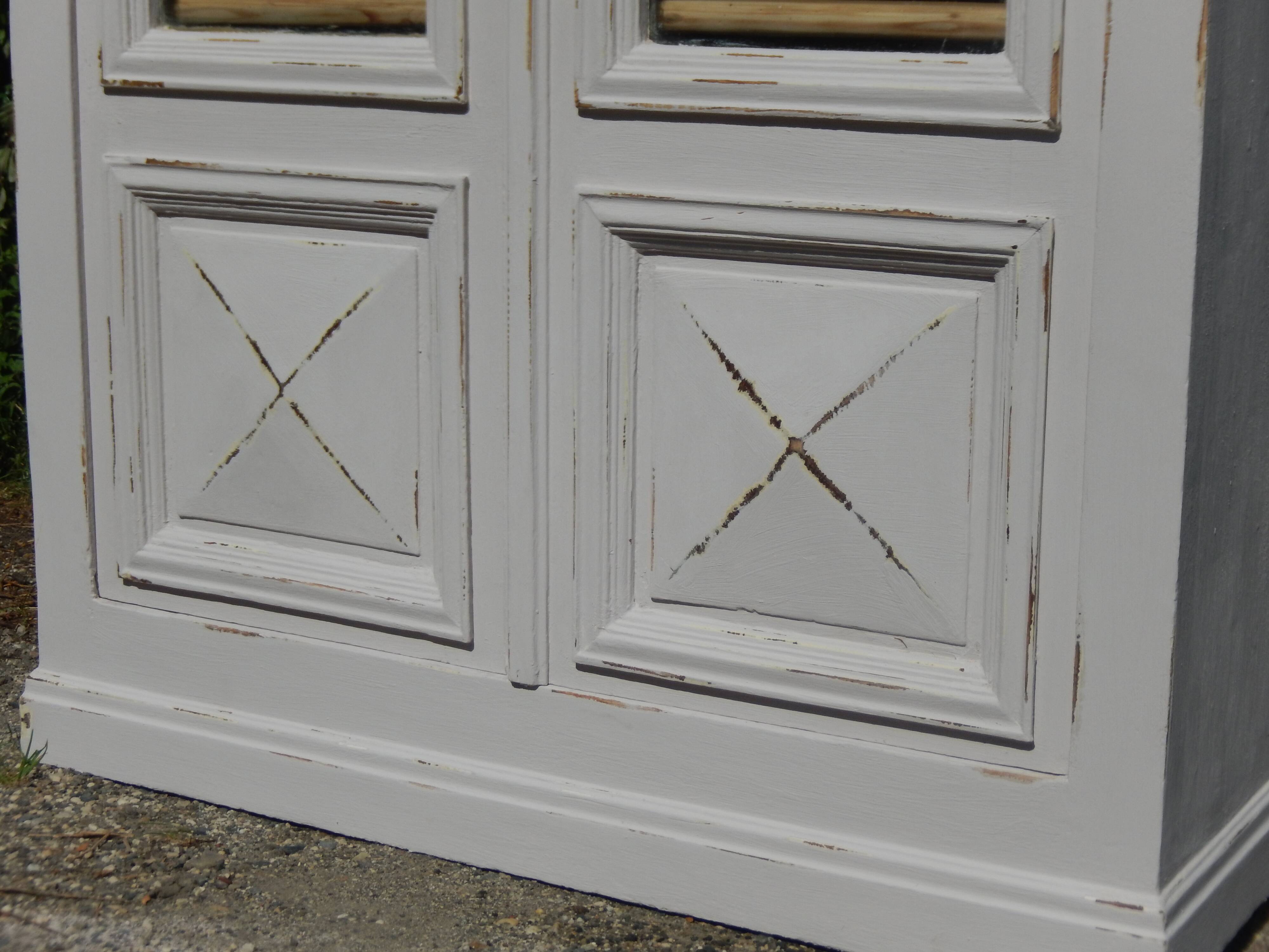 Magnificent old library/display cabinet in fir - white chalk patina.