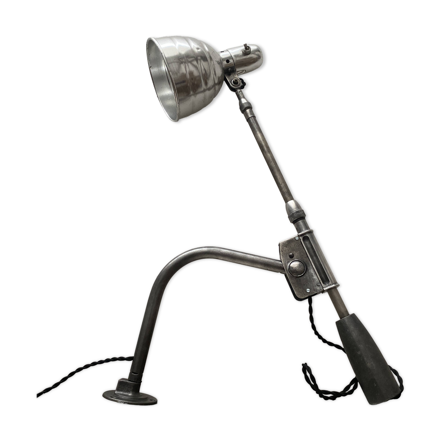 Old industrial wall light with counterweight.