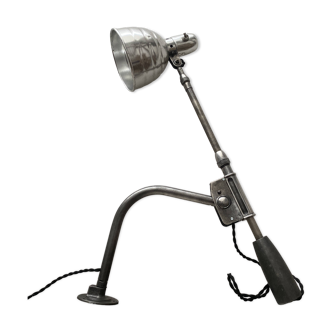 Old industrial wall light with counterweight.