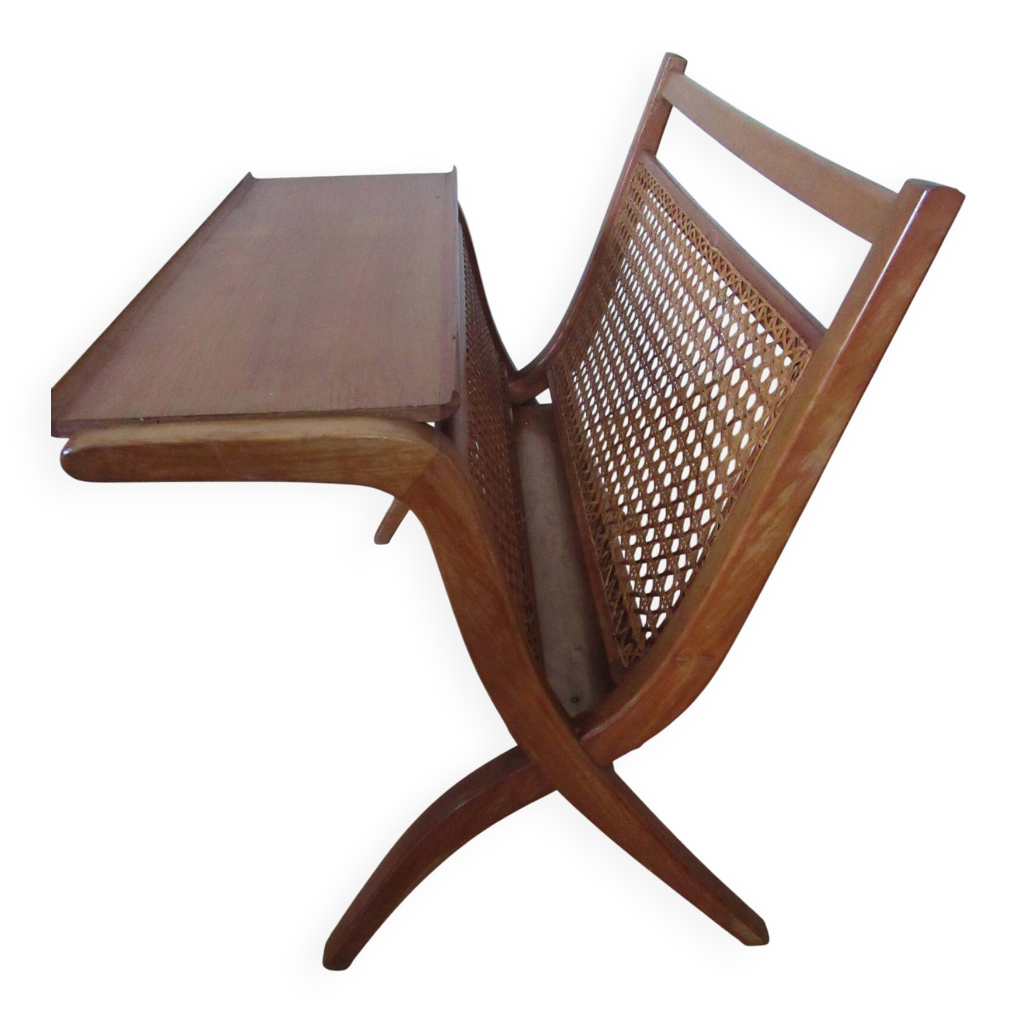 Cane magazine rack with light wood shelf