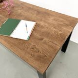 Solid oak dining table from the 70s with metal legs