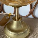 Table lamp with amber glass globe and brass base
