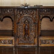 18th-century carved Spanish cabinet with hidden storage.