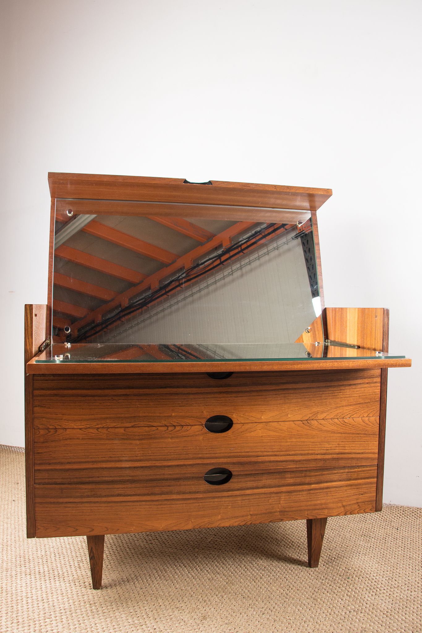 Rosewood chest of drawers designed by Paul Geoffroy published by Roche Bobois.