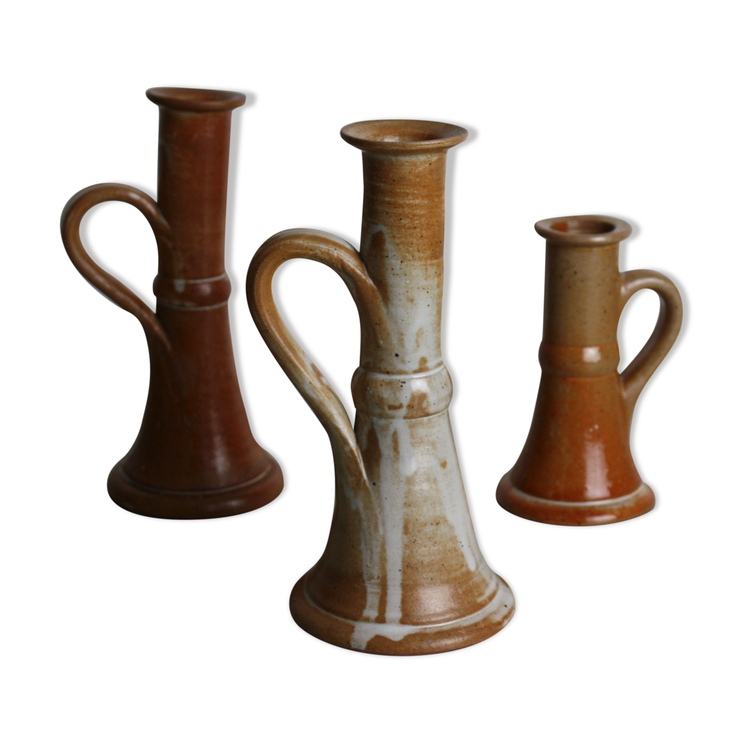 Trio of stoneware candle holders