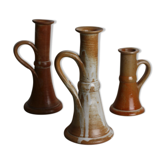 Trio of stoneware candle holders