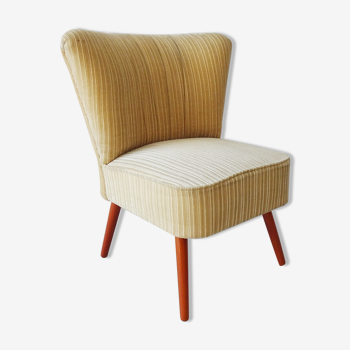 Armchair with beige corduroy upholstery