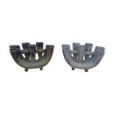 Pair of sandstone candle holders, signed Greber