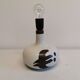 Ceramic table lamp designed by Danish Axel Larsen for his company Axella back in the 1960s.