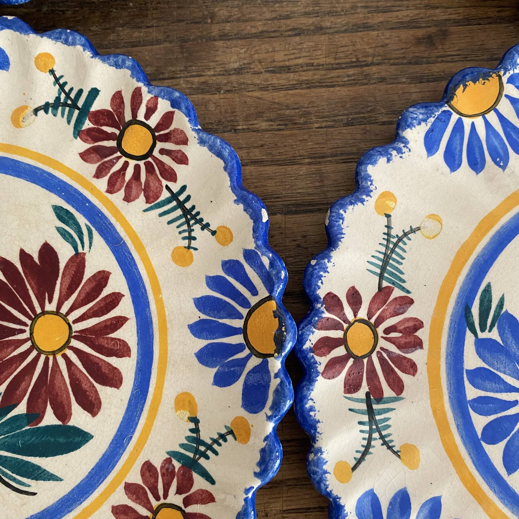 Henriot Quimper dessert plates, hand-painted earthenware.
