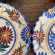 Henriot Quimper dessert plates, hand-painted earthenware.