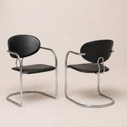 Set of eight cantilever chairs in black faux leather and chrome steel — c. 1980