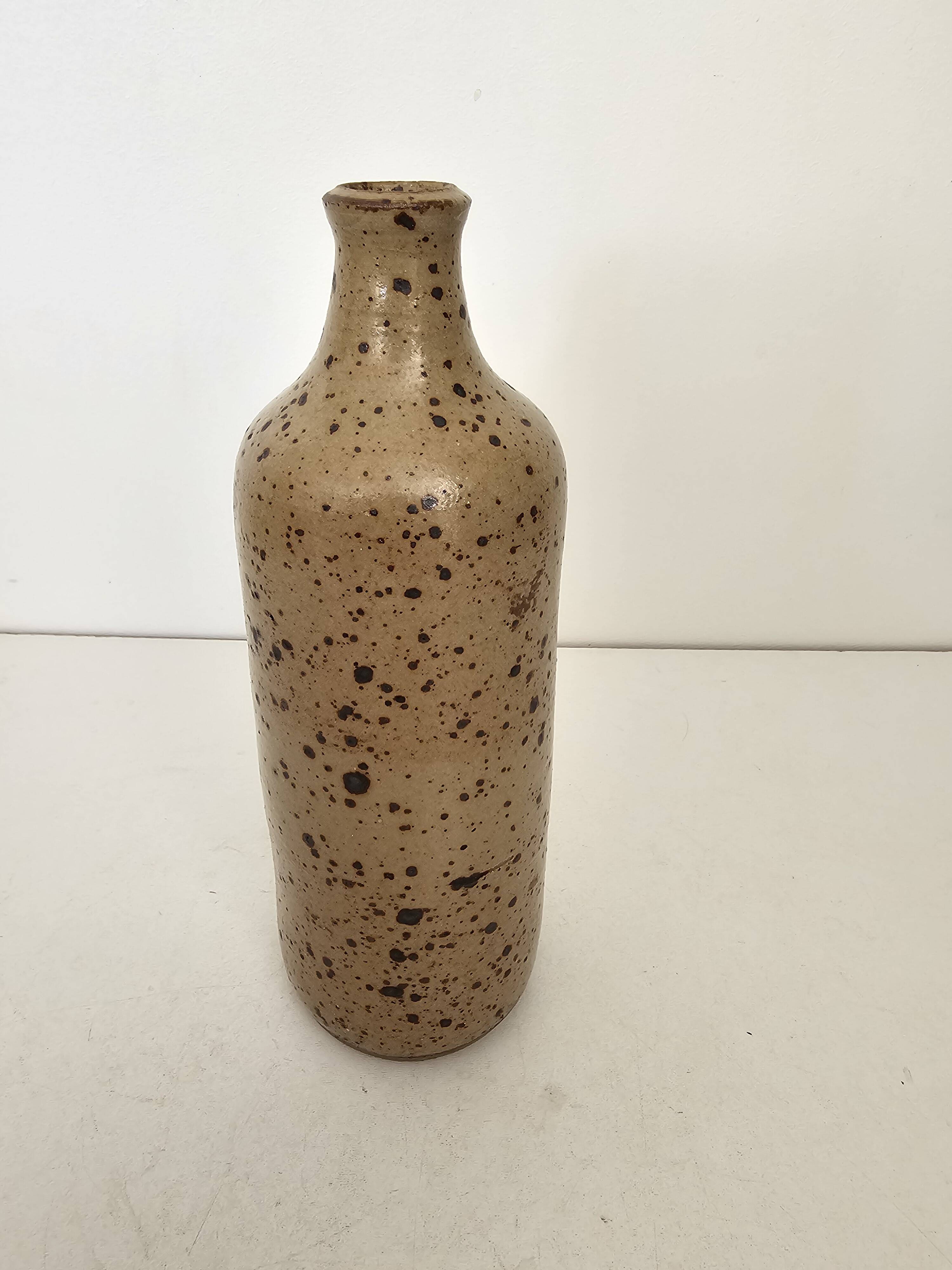 Pyrite stoneware single-flower vase in the shape of a bottle signed Aular?