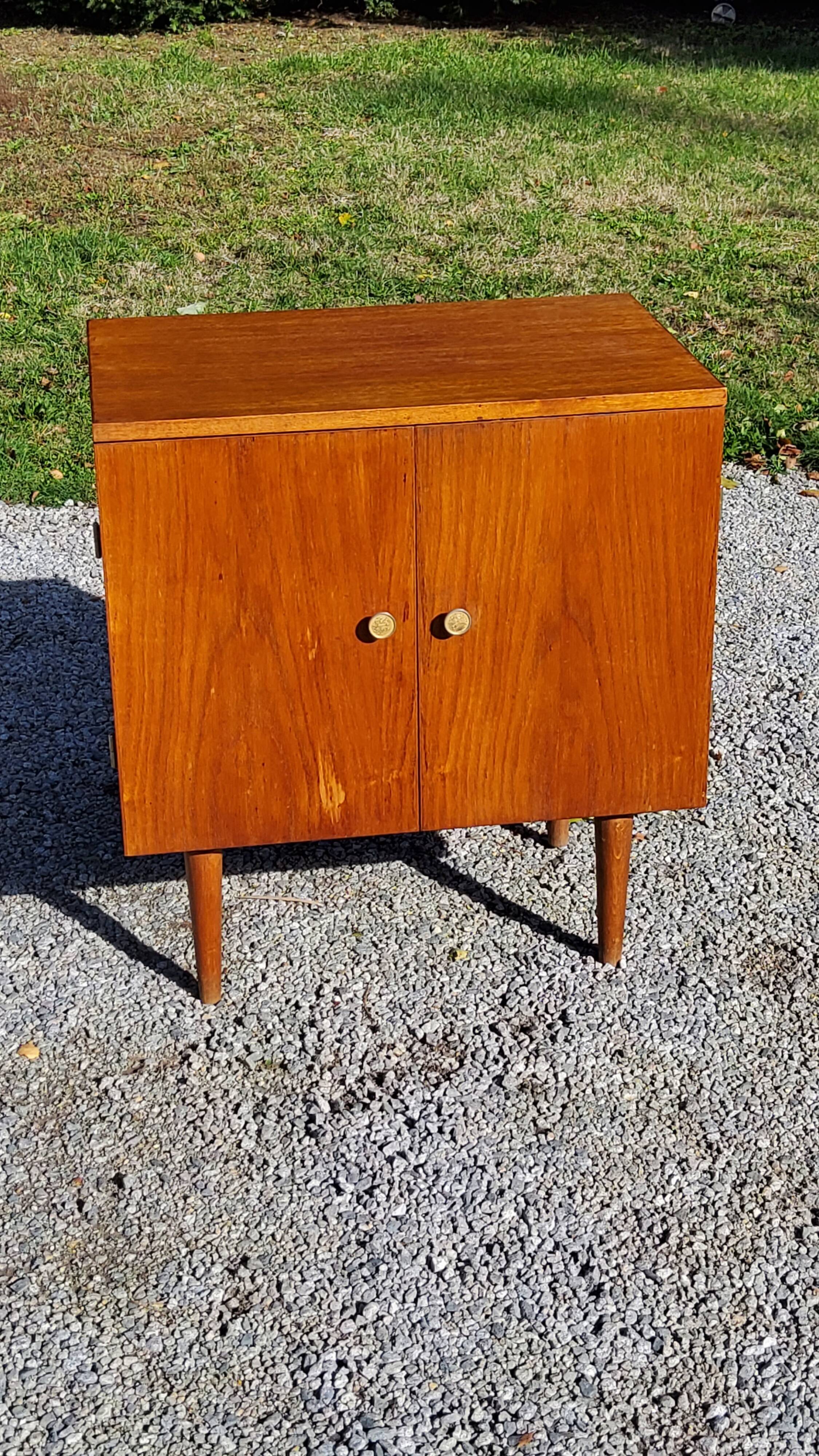 Vintage golden oak sideboard with conical legs from the 1950s