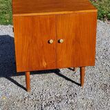 Vintage golden oak sideboard with conical legs from the 1950s