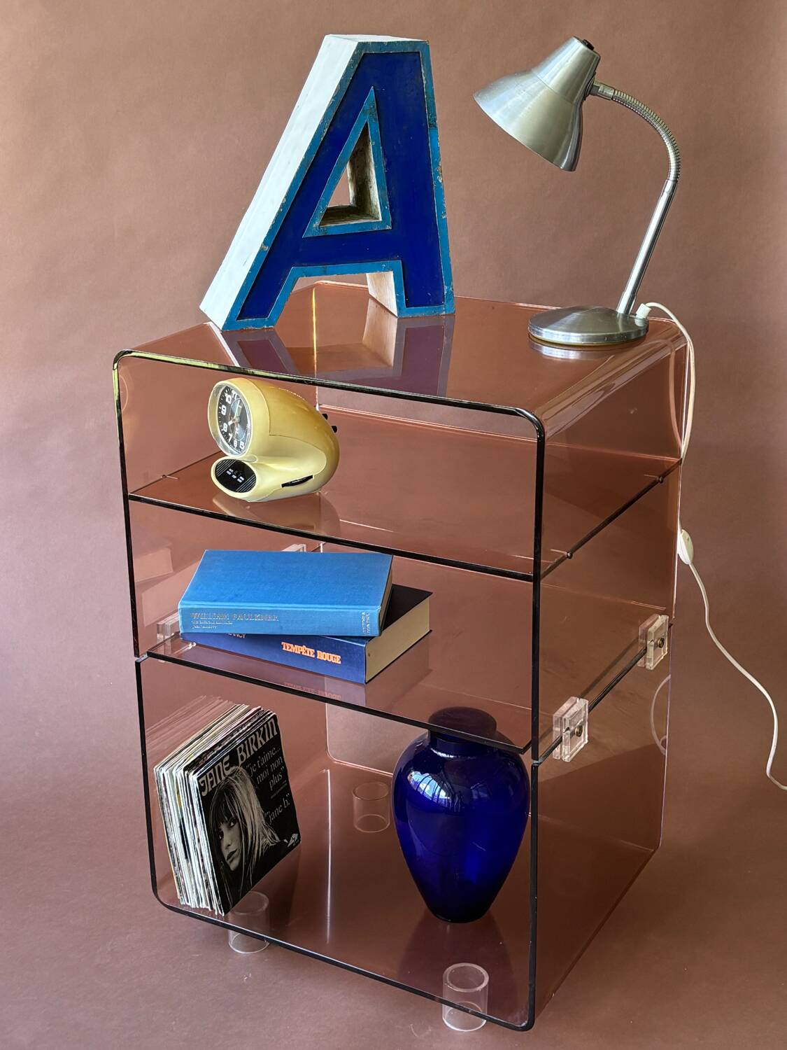 Occasional furniture in smoked Plexiglas from the 70s