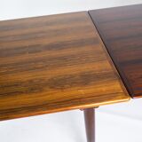 Dining table in rosewood with extensions from the 1960s