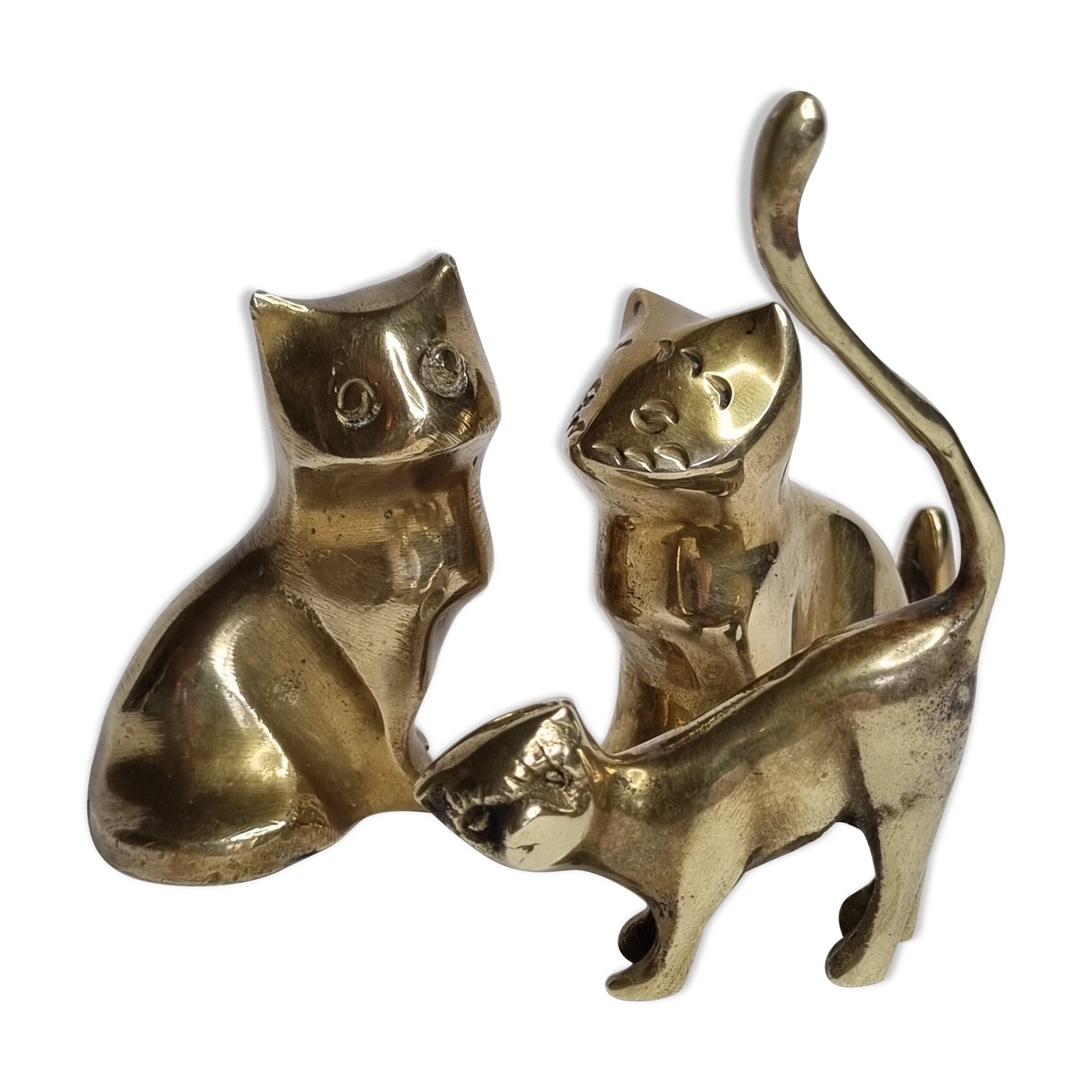 Set of three brass cats