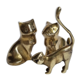 Set of three brass cats