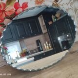 Old beveled oval mirror to pose