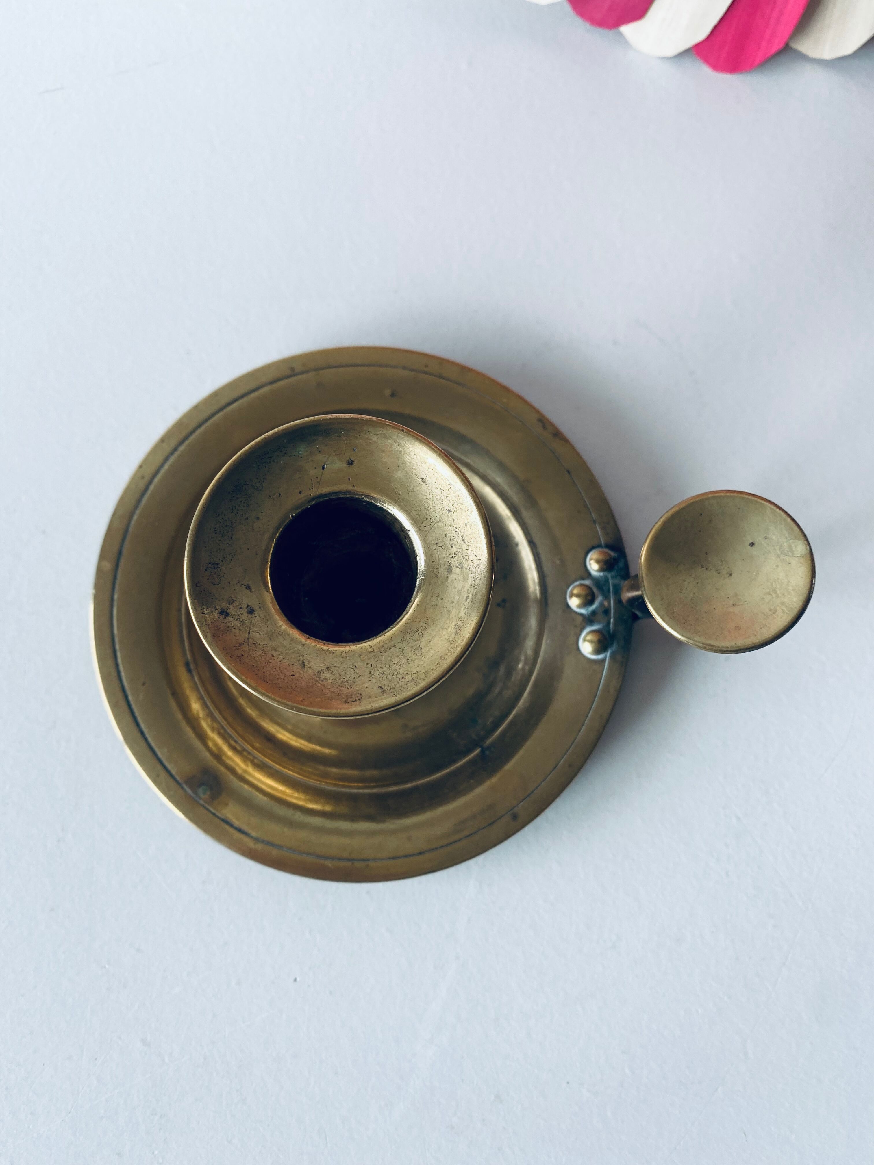 Old candle holder with handle