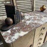 Raw wood chest of drawers with marble top