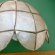 Vintage pendant light in mother-of-pearl and brass.