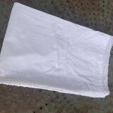 Large pillowcase, white cotton, lined with lace and monogrammed, closed with mother-of-pearl buttons
