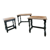 Nest tables in wood and black.
