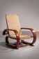 An exceptionally rare mahogany recliner crafted in Italy during the 1950s"